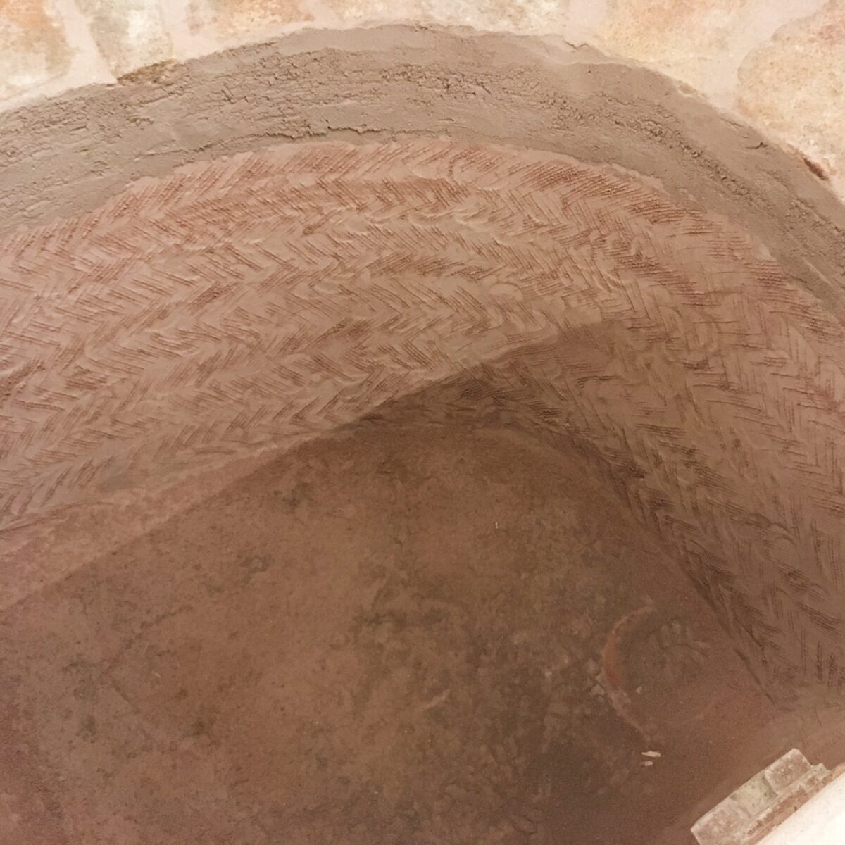 Restauro con intonaci a calce e a cocciopesto